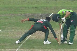 Salman Ali Agha and Bangladesh captain Mehidy Hasan Miraz try to pick up the ball which Miraz got to first and then threw at the stumps to run out the Pakistan batter. (Screengrab via Fan Code)