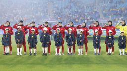 The Iranian players salute the national anthem before the Women's Asian Cup match with the Philippines at Gold Coast Stadium on March 08 2026.