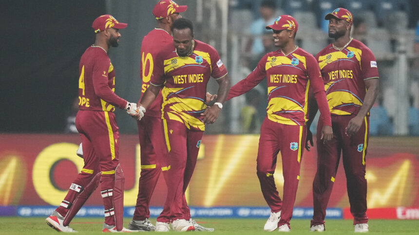 West Indies players celebrate after their win against Zimbabwe during the T20 World Cup cricket match in Mumbai. (AP Photo)