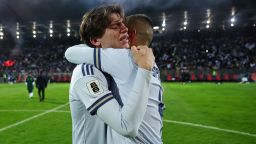 Italy's Marco Palestra, left, and Leonardo Spinazzola console each other after losing a penalty shootout during the World Cup qualifying playoff final soccer match between Bosnia and Italy in Zenica, Bosnia, Tuesday, March 31, 2026.