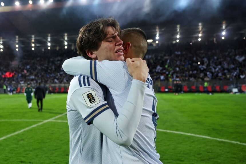 Italy's Marco Palestra, left, and Leonardo Spinazzola console each other after losing a penalty shootout during the World Cup playoff against Bosnia and Herzegovina in Zenica on March 31.