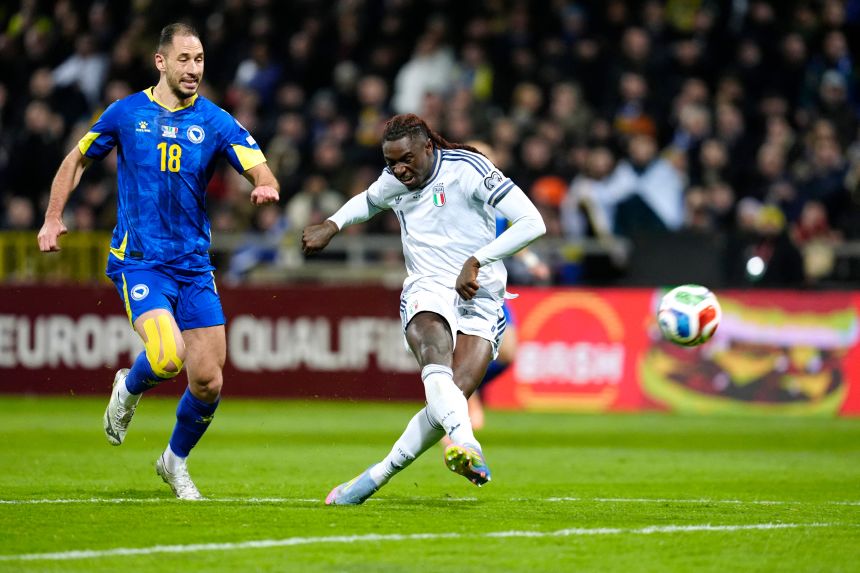 Moise Kean scores the first goal of the match.