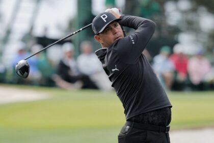 Gary Woodland hits a tee shot Tuesday during a practice round at Augusta National Golf Club.