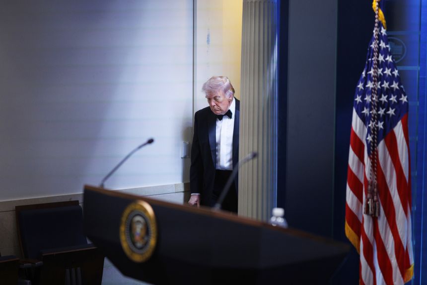 President Donald Trump arrives at the James Brady Press Briefing Room at the White House after a shooting incident outside the ballroom at the annual White House Correspondents' Dinner in Washington, on Saturday.