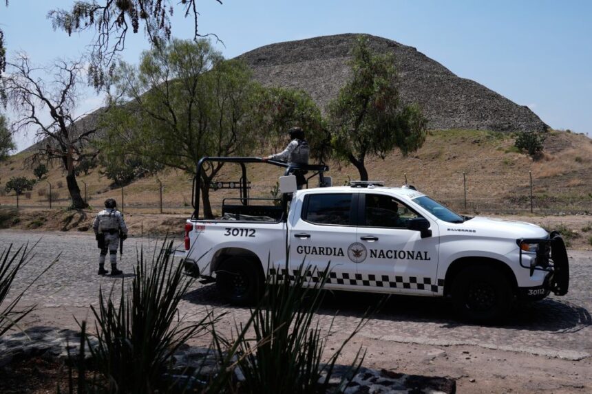 National Guard troops patrol the Teotihuacan pyramids, which remained closed a day after a gunman opened fire on tourists at the archaeological site outside Mexico City, on Tuesday.