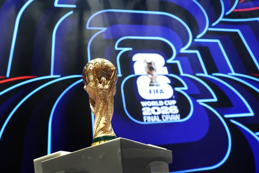 The World Cup trophy is seen on stage at the Kennedy Center ahead of the Official Draw on December 3, 2025 in Washington, DC.
