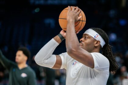 Oklahoma City Thunder guard Lu Dort warms up prior to the game against the San Antonio Spurs at Paycom Center on December 25, 2025 in Oklahoma City.
