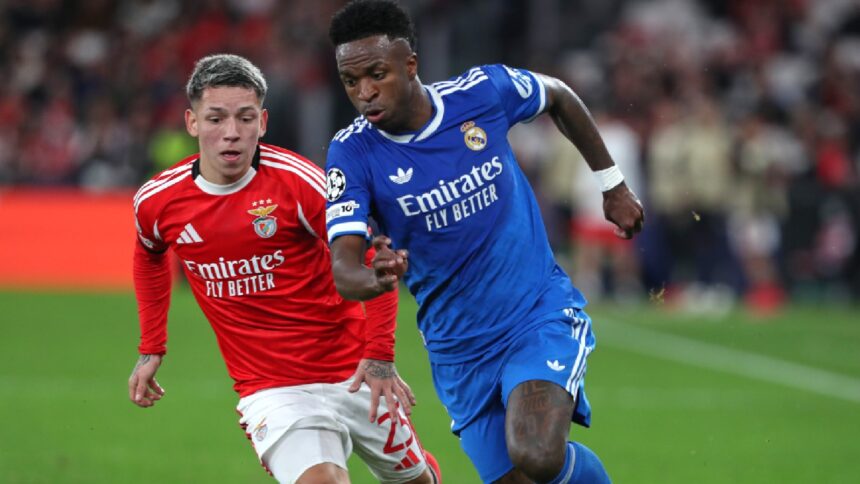 The new rule on players receiving red cards for covering their mouths comes after Benfica's Gianluca Prestianni was accused of homophobic abuse of Real Madrid's Vinicius Junior during a Champions League game by covering his mouth with his jersey. (PHOTO: AP)