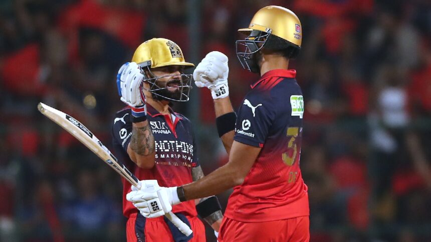 Royal Challengers Bengaluru's Virat Kohli celebrates his fifty runs with batting partner Devdutt Padikkal during the Indian Premier League cricket match between Royal Challengers Bengaluru and Gujarat Titans in Bengaluru, India, Friday, April 24, 2026. (AP Photo)