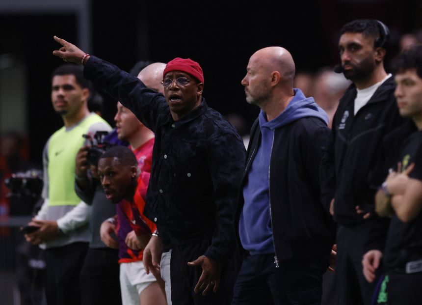 Premier League legends Ian Wright, left, and Alan Shearer manage Wembley Rangers AFC during a Baller League match in December.
