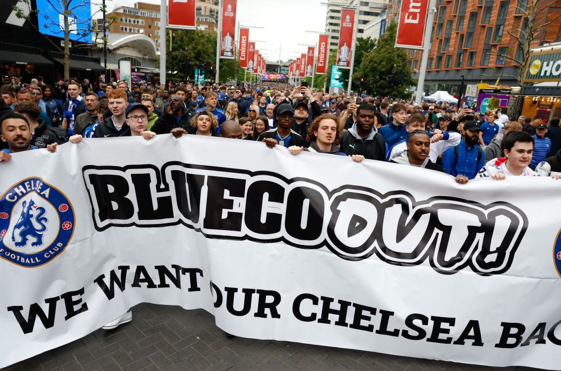Chelsea fans with a banner outside the stadium before the match in protest to ownership group BlueCo.