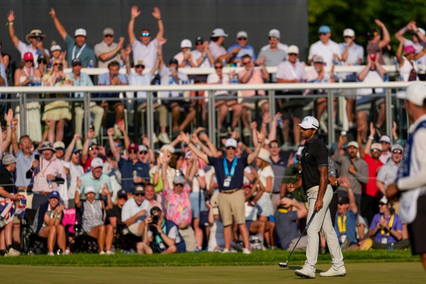 Aaron Rai celebrates after his long putt on the 17th green during the final round of the PGA Championship.