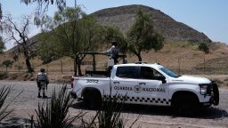 National Guard troops patrol the Teotihuacan pyramids, which remained closed a day after a gunman opened fire on tourists at the archaeological site outside Mexico City, on Tuesday.
