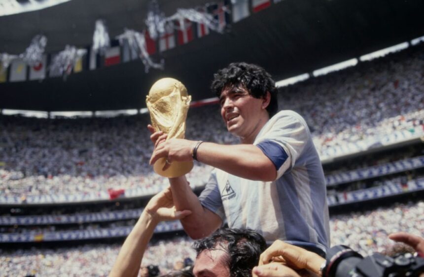 Argentinian soccer legend Diego Armando Maradona holding the World Cup trophy after the Albiceleste defeated West Germany 3-2 in the 1986 FIFA World Cup Final at the Azteca Stadium in Mexico City, Mexico on June 29, 1986.