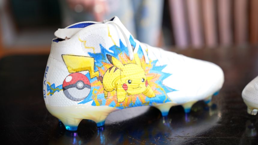 Here, Dawson has boots with the popular Pokémon Pikachu.