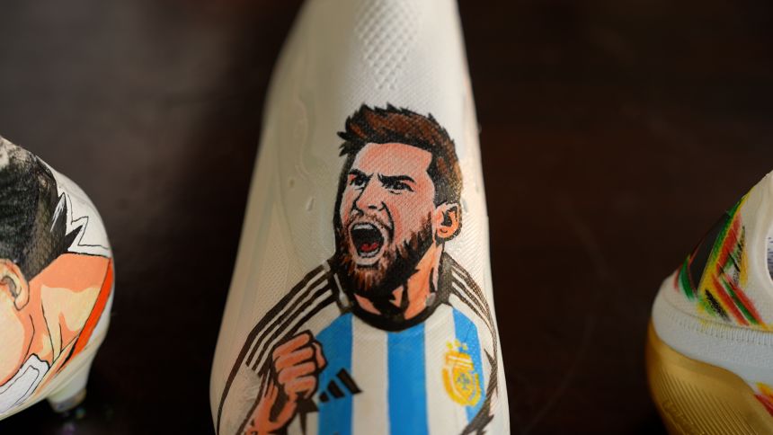 It's not just animated characters that Dawson includes on his works of art. This boot has soccer superstar Lionel Messi on it.