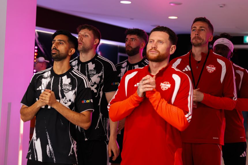 Vikram Singh Barn, known as Vikkstar123, is seen on left next to Ethan Leigh Payne, aka Behzinga, before this year's Sidemen match.