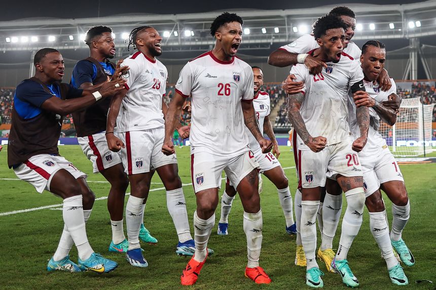 Cape Verde's forward Ryan Mendes (number 20, third from the right) celebrates with teammates after scoring his team's first goal from the penalty spot during the Africa Cup of Nations 2024 round of 16 football match against Mauritania at the Felix Houphouet-Boigny Stadium in Abidjan on January 29, 2024.