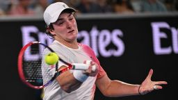 Brazil's Joao Fonseca hits a shot against Russia's Andrey Rublev during their men's singles match on day three of the Australian Open tennis tournament in Melbourne on January 14, 2025. (Photo by WILLIAM WEST / AFP) / -- IMAGE RESTRICTED TO EDITORIAL USE - STRICTLY NO COMMERCIAL USE -- (Photo by WILLIAM WEST/AFP via Getty Images)