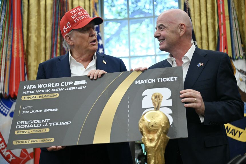 FIFA president Gianni Infantino and US President Donald Trump with a FIFA world Cup ticket for the final match in the Oval Office of the White House in August 2025.