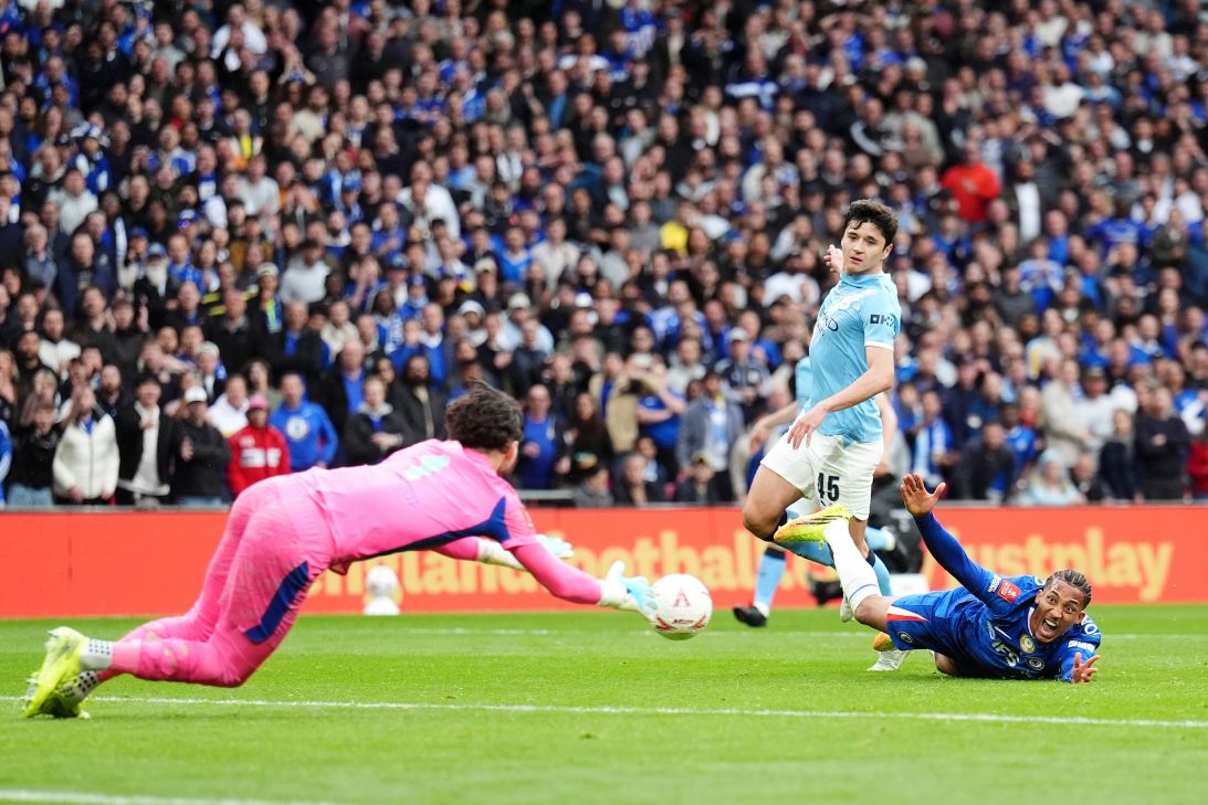 Chelsea's Joao Pedro (right) reacts as he goes down in the penalty area during the FA Cup final at Wembley Stadium in London.