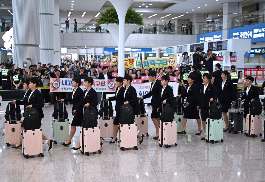North Korea's Naegohyang Women's FC players arrive at Incheon International Airport on Sunday ahead of the Women's Asian Champions League semi-final football match against South Korea's Suwon FC Women.