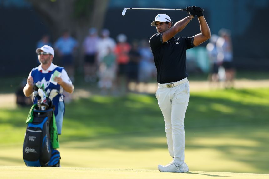 Aaron Rai plays a shot on the 15th hole during the final round of the PGA Championship on Sunday.