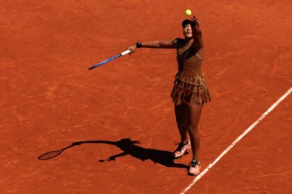 Naomi Osaka serves against Laura Siegemund at the 2026 French Open at Roland Garros on May 26 in Paris, France.