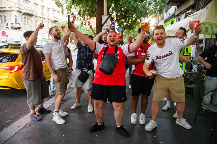Arsenal supporters cheer for their club in downtown Budapest on Friday.