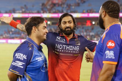 RCB's Krunal Pandya (C) with MI owner Anant Ambani (L) and MI batting coach Kieron Pollard. (CREIMAS FOR IPL)