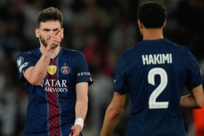 PSG's Khvicha Kvaratskhelia celebrates with Achraf Hakimi after scoring his side's fourth goal during the Champions League semifinal first leg soccer match between Paris Saint-Germain and Bayern Munich in Paris, Tuesday, April 28, 2026. (AP Photo)
