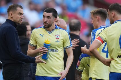 File image of Southampton's coach Tonda Eckert, left, talks to his players during the FA Cup semifinal soccer match between Manchester City and Southampton in Manchester, England, Saturday, April 25, 2026. (AP Photo)