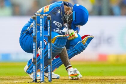 File image of Mumbai Indians' Suryakumar Yadav reacting after being hit by a ball during the Indian Premier League cricket match between Mumbai Indians and Chennai Super Kings in Mumbai. (AP Photo)