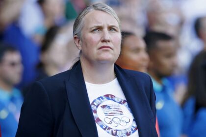 United States head coach Emma Hayes looks on during the national anthem before the women's soccer gold medal match at the 2024 Olympics.
