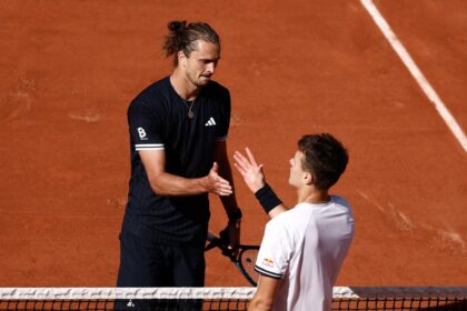 Germany's Alexander Zverev shakes hands with Czech Republic's Jakub Mensik after winning his semifinal match.