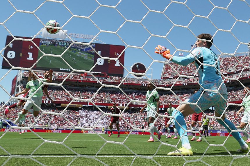 Qatar’s Boualem Khoukhi scored a memorable goal against Switzerland in his nation’s opener.