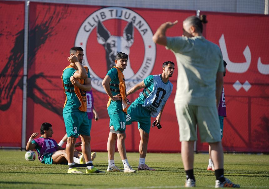 Mehdi Torabi (center) received some welcome news following some visa issues.