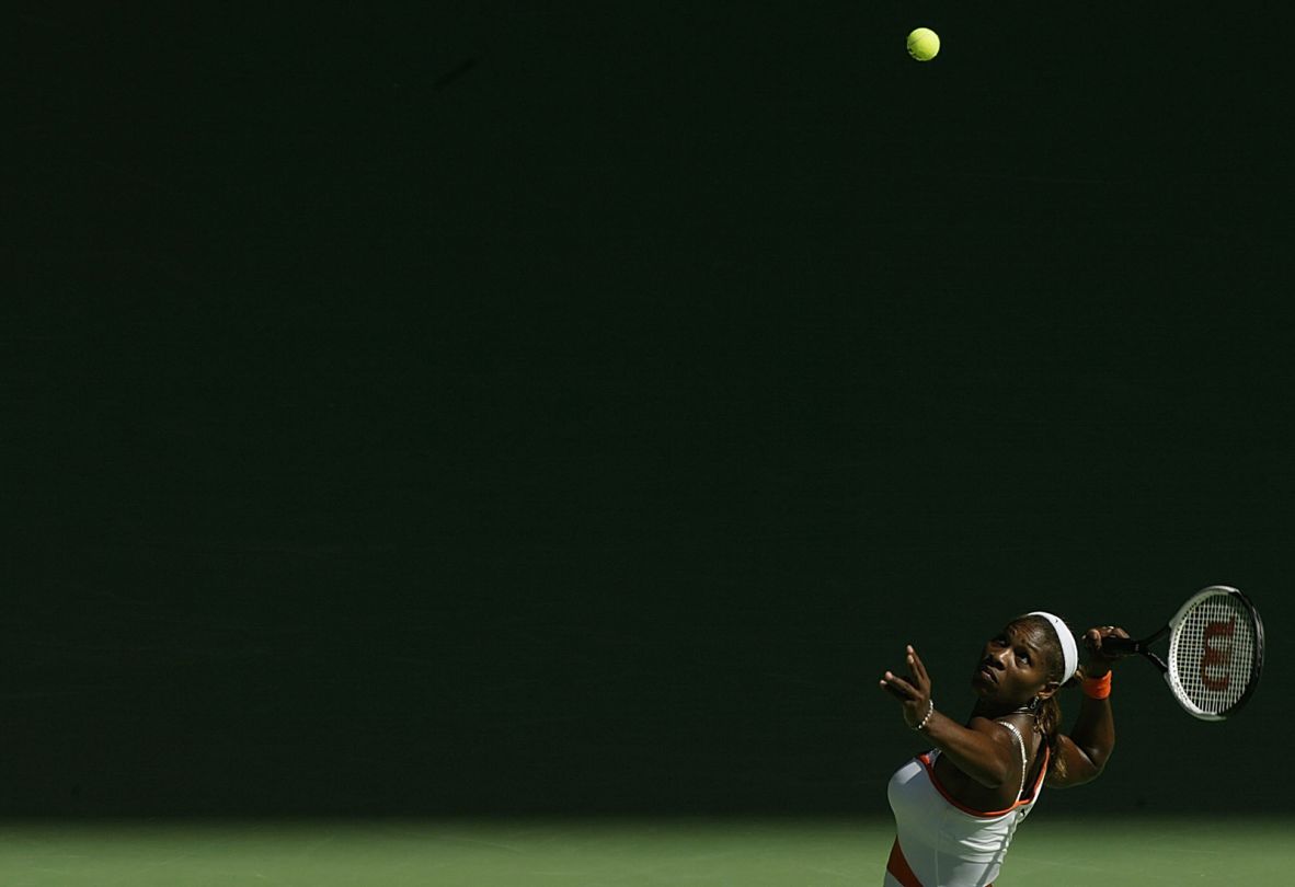 Serena serves during the Australian Open in 2003. She defeated her sister Venus in the final that year.