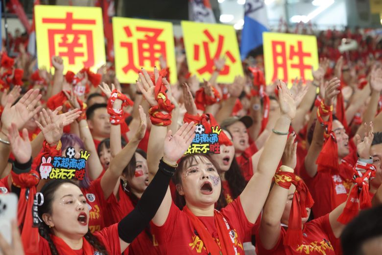 Fans cheer for their team during the <em>Suchao</em> final in November.