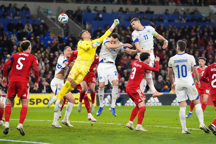Bosnia and Herzegovina's Edin Džeko - seen here scoring a header - is a veteran presence for a squad that knocked out Italy.