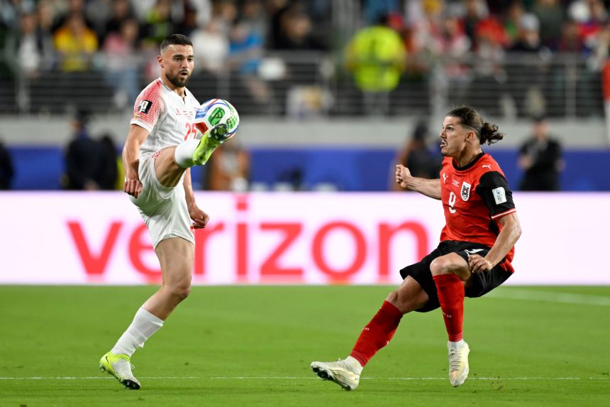 Jordan's Mohammad Aldaoud controls the ball against Austria's Marcel Sabitzer on June 16.