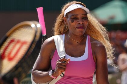Serena Williams arrives at a training session at the All England Lawn Tennis and Croquet Club in London on Thursday.