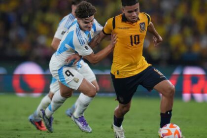 Argentina's Julian Alvarez (left) battles for the ball during a World Cup 2026 qualifying soccer match at Banco Pichincha stadium in Guayaquil, Ecuador, Tuesday, Sept. 9, 2025. (AP Photo)