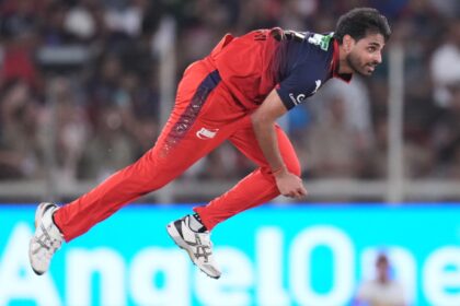 Royal Challengers Bengaluru's Bhuvneshwar Kumar bowls a delivery during the Indian Premier League final cricket match between Gujarat Titans and Royal Challengers Bengaluru in Ahmedabad, India, Sunday, May 31, 2026. (AP Photo)