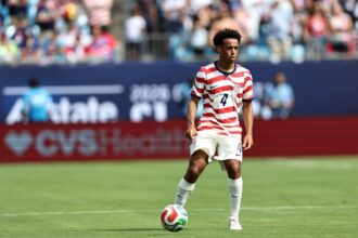 Tyler Adams controls the ball during a friendly against Senegal at Bank of America Stadium on May 31, in Charlotte, North Carolina.