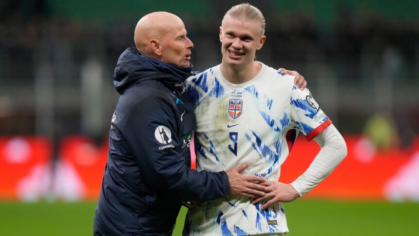 Erling Haaland and head coach Stale Solbakken celebrate after the 2026 World Cup Group I qualifier match against Italy (AP Photo)