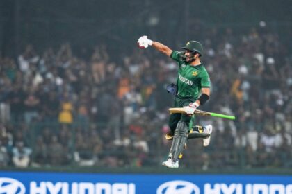 Pakistan's Sahibzada Farhan celebrates his century during the T20 World Cup cricket match between Pakistan and Sri Lanka in Pallekele, Sri Lanka, Saturday, Feb. 28, 2026. (AP Photo/Eranga Jayawardena)