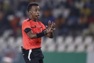 Somalian referee Omar Abdulkadir Artan gestures during the Africa Cup of Nations group match between Mauritania and Algeria in January 2024.