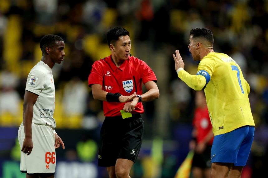Referee Ma Ning reacts towards Cristiano Ronaldo of Al Nassr during the second leg of the AFC Champions League Round of 16 match between Al Nassr and Al Fayha at Al Awwal Park on February 21, 2024 in Riyadh, Saudi Arabia.