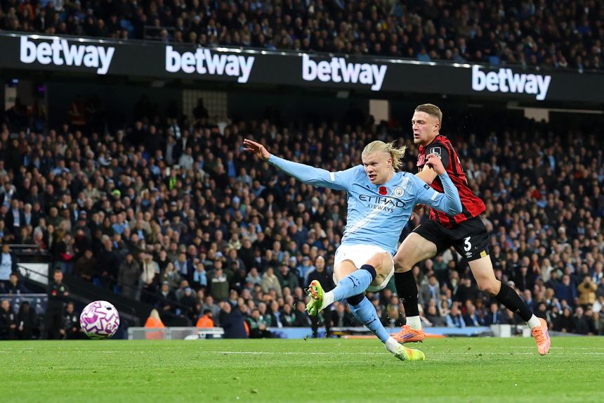 Erling Haaland scores a goal for Manchester City during a Premier League match against Bournemouth in December.
